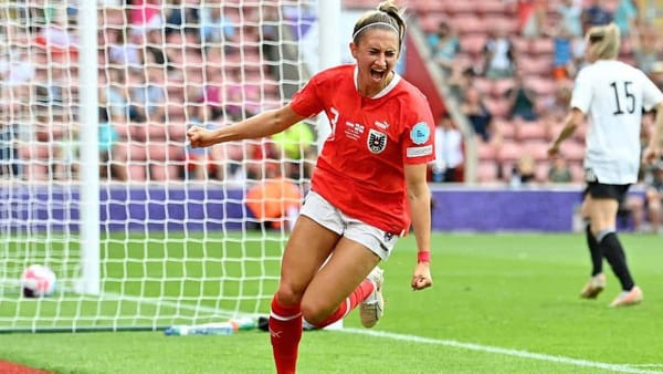 Katharina Naschenweng wheels away in celebration after sealing the tie with composed play and finish